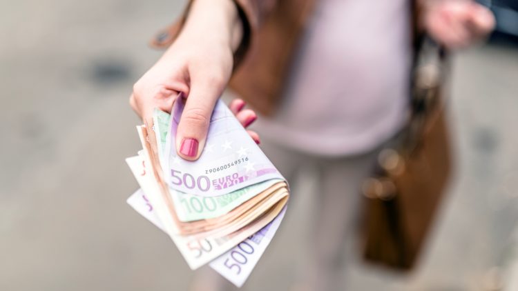 money finances concept woman giving money